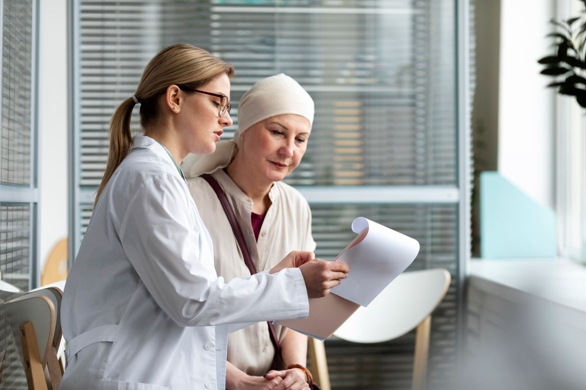 middle-aged-woman-with-skin-cancer-talking-with-her-doctor.jpg