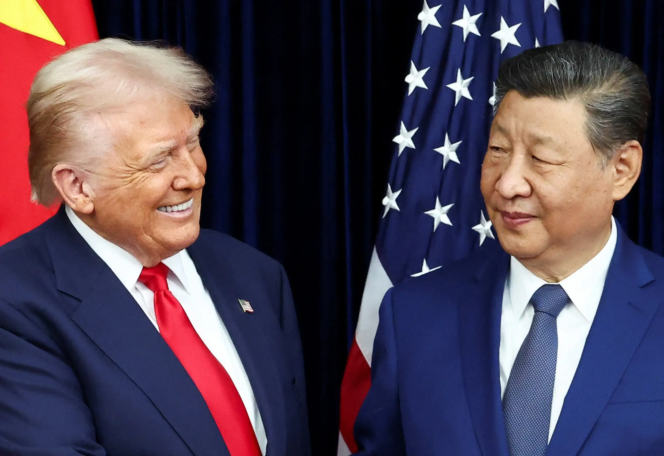 2025-10-30T032931Z_547391265_RC23MHAQTBYM_RTRMADP_3_USA-TRUMP-XI.jpg