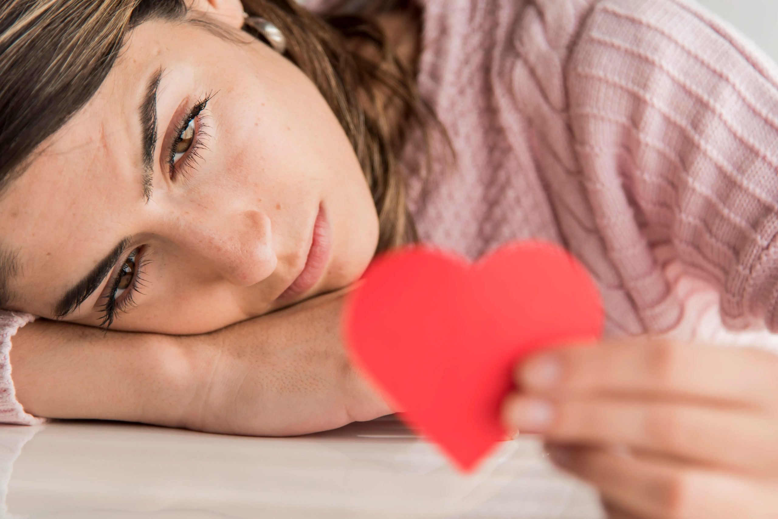 close-up-woman-holding-heart.jpg